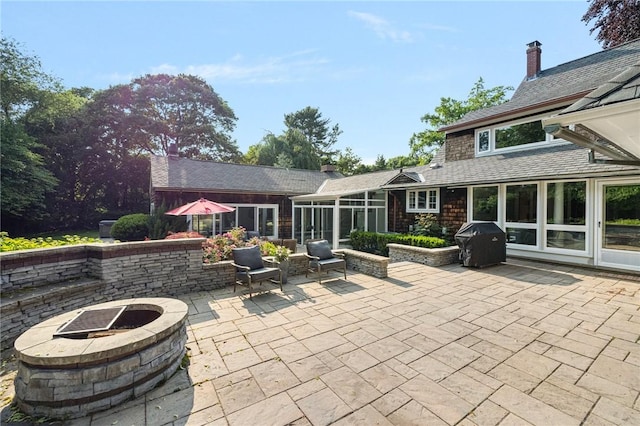 211 Rumstick Rd, Barrington, RI 02806 - view of patio featuring a fire pit, area for grilling, and a sunroom