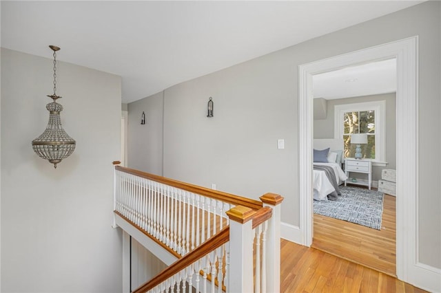 211 Rumstick Rd, Barrington, RI 02806 - hallway featuring light wood-style floors and an upstairs landing