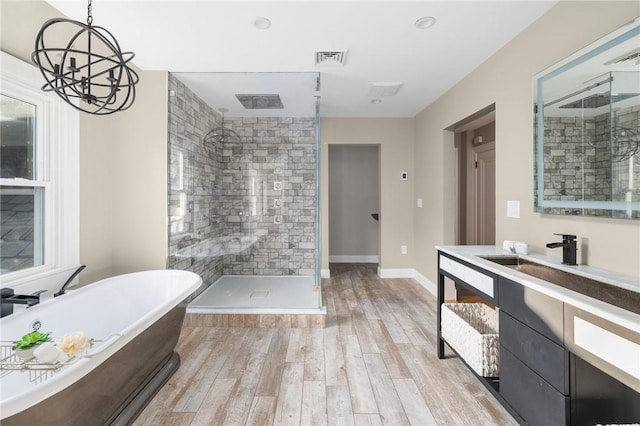 211 Rumstick Rd, Barrington, RI 02806 - full bathroom with a stall shower, a soaking tub, wood finished floors, and vanity