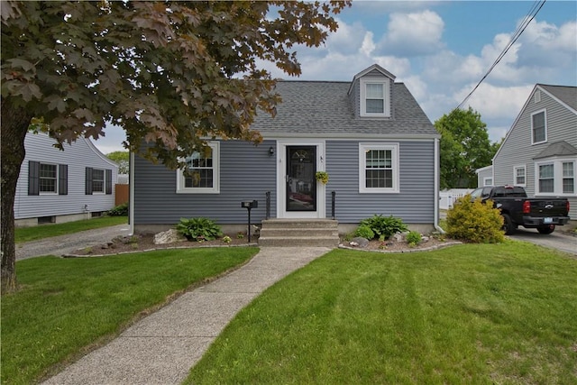 116 Daggett Ave, Pawtucket, RI 02861 - view of front of property featuring a front lawn and a shingled roof