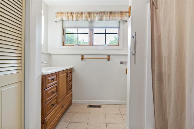 75 Circuit Dr, Narragansett, RI 02882 - full bath with vanity, tile patterned flooring, and baseboards