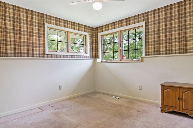 75 Circuit Dr, Narragansett, RI 02882 - carpeted empty room with wallpapered walls, baseboards, and a ceiling fan