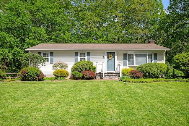 70 High Ridge Dr, Cumberland, RI 02864 - view of front facade featuring a chimney and a front lawn