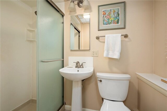 70 High Ridge Dr, Cumberland, RI 02864 - bathroom featuring toilet, a shower stall, and a sink
