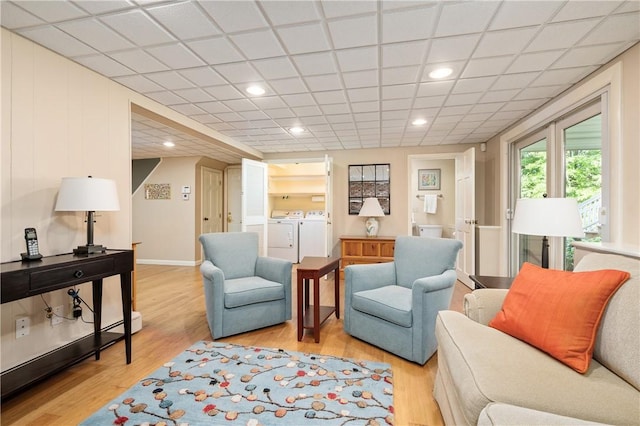 70 High Ridge Dr, Cumberland, RI 02864 - living room with washer and clothes dryer, light wood-type flooring, baseboards, and recessed lighting