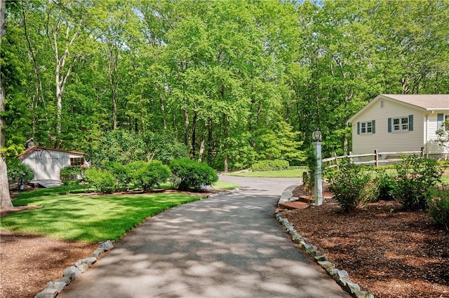 70 High Ridge Dr, Cumberland, RI 02864 - view of green lawn featuring a wooded view