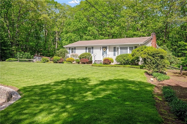 70 High Ridge Dr, Cumberland, RI 02864 - view of front of house featuring a chimney and a front lawn