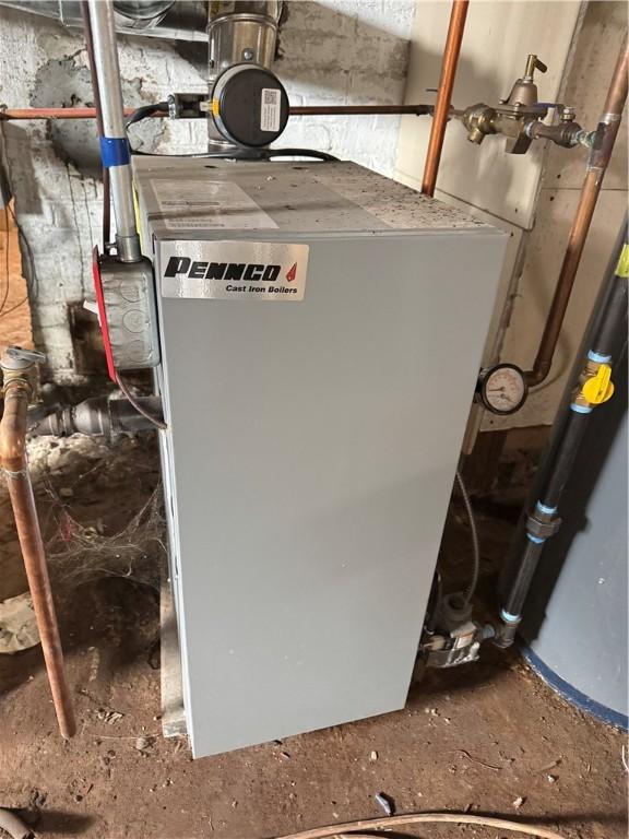 143 Mineral Spring Ave, Pawtucket, RI 02860 - utility room featuring a heating unit