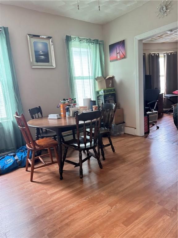 143 Mineral Spring Ave, Pawtucket, RI 02860 - dining space with light wood-style flooring