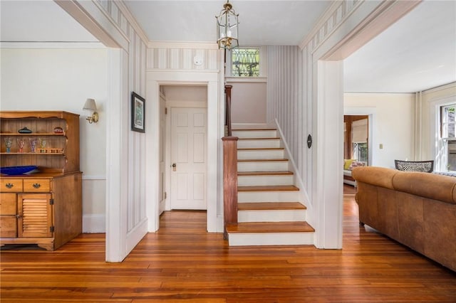 130 Highland Rd, Tiverton, RI 02878 - stairs with wood-type flooring and a chandelier