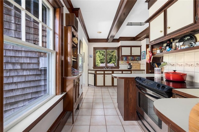 130 Highland Rd, Tiverton, RI 02878 - kitchen with stainless steel electric range oven, backsplash, white cabinetry, light tile patterned floors, and open shelves