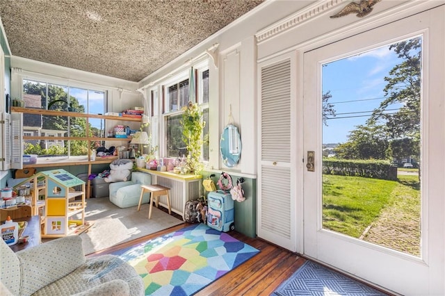 130 Highland Rd, Tiverton, RI 02878 - sunroom with radiator heating unit