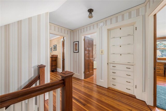 130 Highland Rd, Tiverton, RI 02878 - hall with wallpapered walls, hardwood / wood-style floors, and an upstairs landing