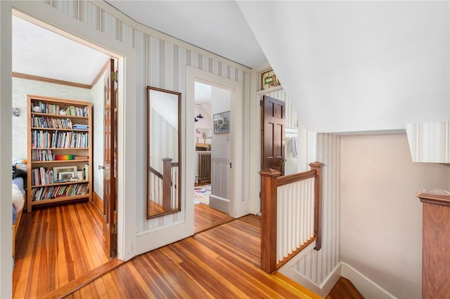 130 Highland Rd, Tiverton, RI 02878 - corridor with an upstairs landing, hardwood / wood-style floors, and wallpapered walls