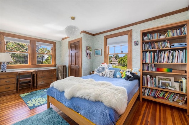 130 Highland Rd, Tiverton, RI 02878 - bedroom featuring radiator heating unit, wood finished floors, multiple windows, crown molding, and wallpapered walls