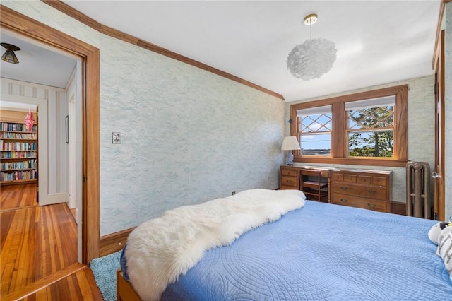 130 Highland Rd, Tiverton, RI 02878 - bedroom with wallpapered walls, hardwood / wood-style flooring, ornamental molding, and lofted ceiling