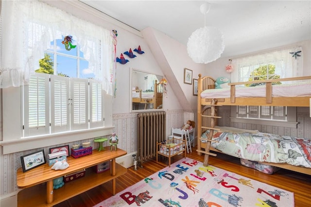 130 Highland Rd, Tiverton, RI 02878 - bedroom with radiator, wood finished floors, and a wainscoted wall