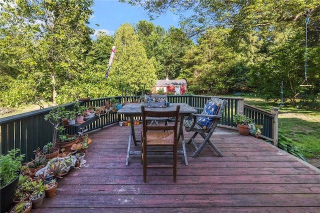 130 Highland Rd, Tiverton, RI 02878 - wooden terrace featuring outdoor dining area and a shed