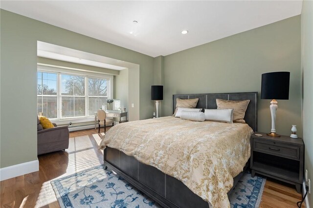 423 Hope St Unit C, Bristol, RI 02809 - bedroom with light wood-type flooring, baseboards, and recessed lighting