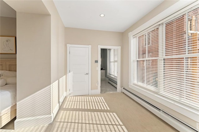 423 Hope St Unit C, Bristol, RI 02809 - corridor with a baseboard radiator, carpet flooring, baseboards, and recessed lighting