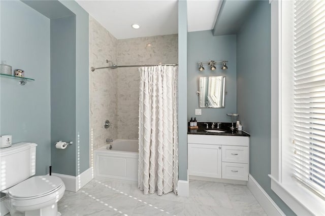 423 Hope St Unit C, Bristol, RI 02809 - bathroom with toilet, marble look tiles, baseboards, shower / bath combination with curtain, and vanity