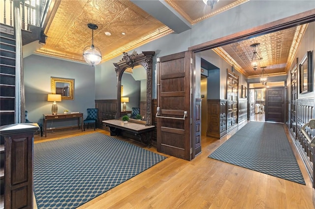 423 Hope St Unit C, Bristol, RI 02809 - interior space featuring ornamental molding, an ornate ceiling, wood finished floors, and arched walkways