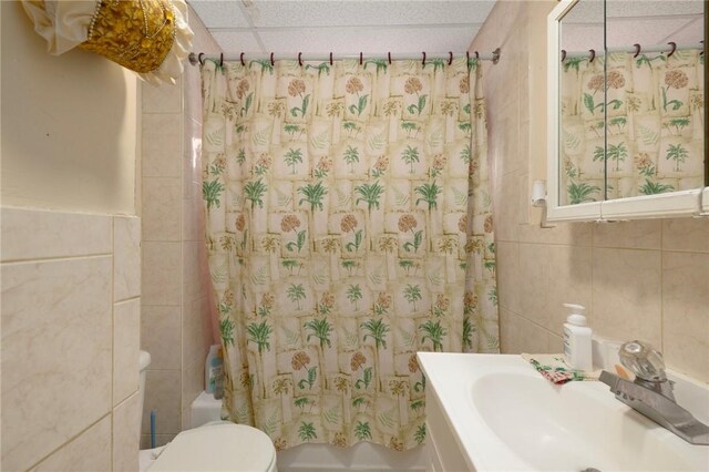 9 Sackett St, Providence, RI 02907 - full bath with tile walls, shower / bath combination with curtain, vanity, and toilet