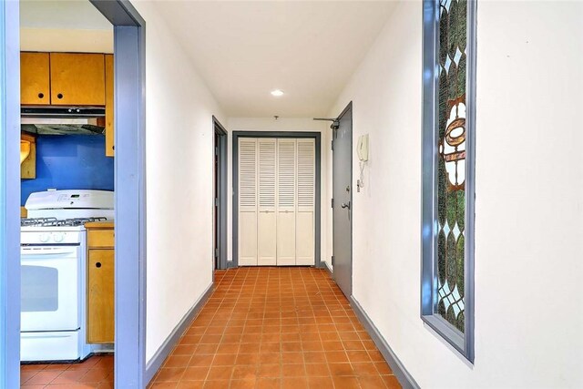 116 Chestnut St Unit G, Providence, RI 02903 - corridor with recessed lighting, light tile patterned flooring, and baseboards