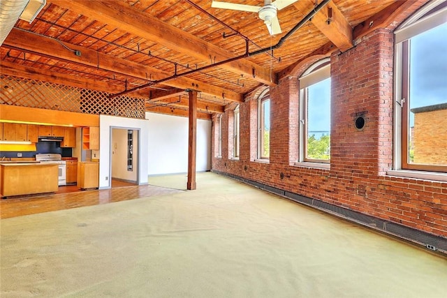116 Chestnut St Unit G, Providence, RI 02903 - basement with wooden ceiling and brick wall