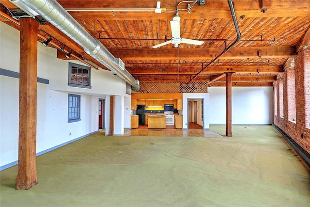 116 Chestnut St Unit G, Providence, RI 02903 - basement with a ceiling fan, freestanding refrigerator, and baseboards