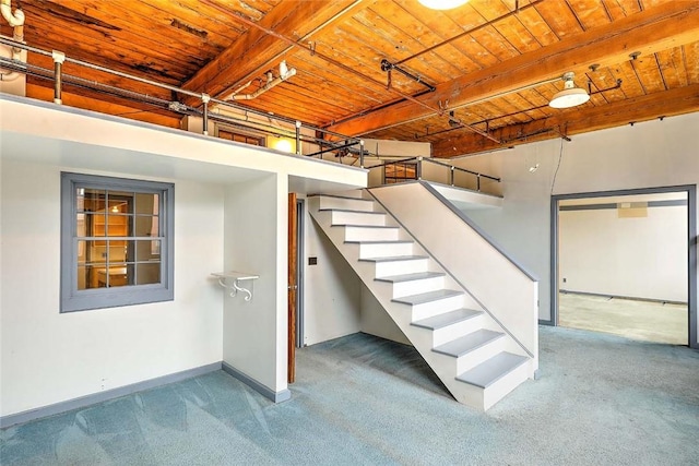 116 Chestnut St Unit G, Providence, RI 02903 - below grade area featuring wooden ceiling, carpet, baseboards, and stairs