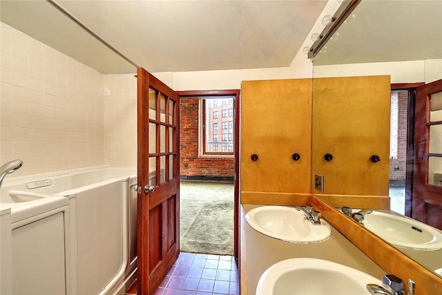 116 Chestnut St Unit G, Providence, RI 02903 - bathroom featuring tile patterned floors, double vanity, and shower / bathtub combination