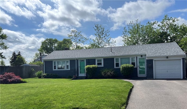 205 Carolyn St, Warwick, RI 02886 - ranch-style house featuring a garage, a shingled roof, and driveway