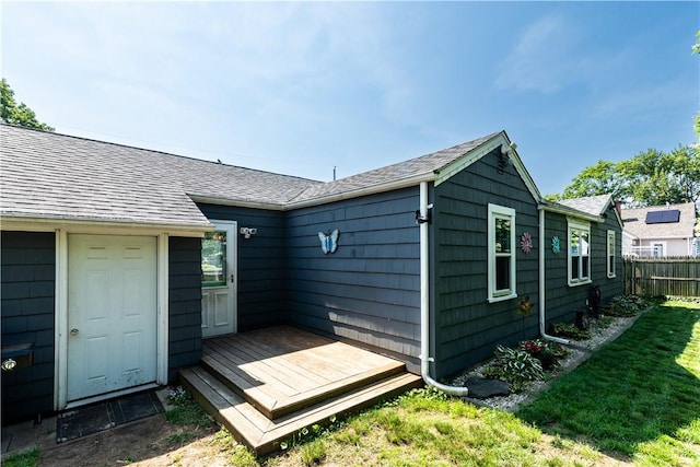 205 Carolyn St, Warwick, RI 02886 - back of property featuring a shingled roof