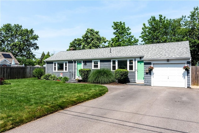 205 Carolyn St, Warwick, RI 02886 - single story home with a garage, asphalt driveway, a shingled roof, and a chimney