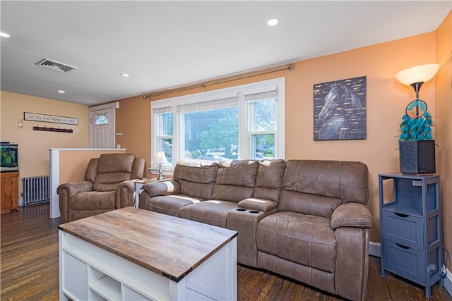 205 Carolyn St, Warwick, RI 02886 - living area featuring dark wood finished floors, radiator, and recessed lighting