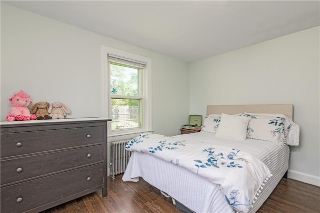 205 Carolyn St, Warwick, RI 02886 - bedroom with radiator and dark wood-style floors
