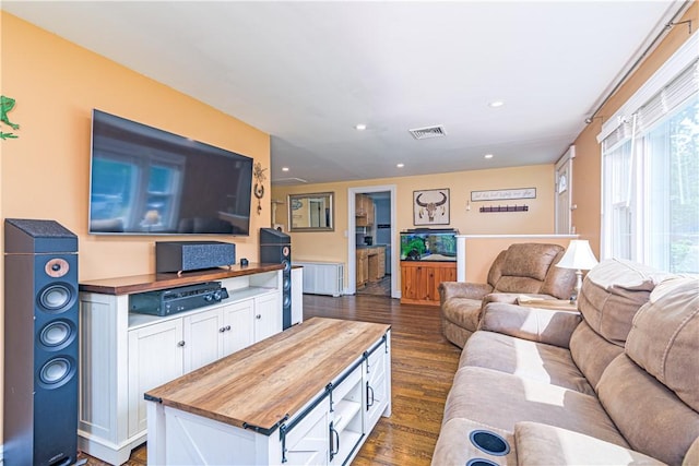 205 Carolyn St, Warwick, RI 02886 - living area with dark wood-type flooring and recessed lighting