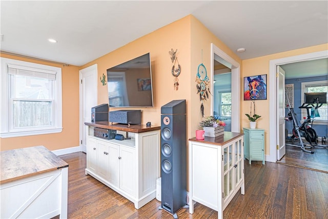 205 Carolyn St, Warwick, RI 02886 - kitchen with wood counters, dark wood-type flooring, white cabinets, plenty of natural light, and recessed lighting