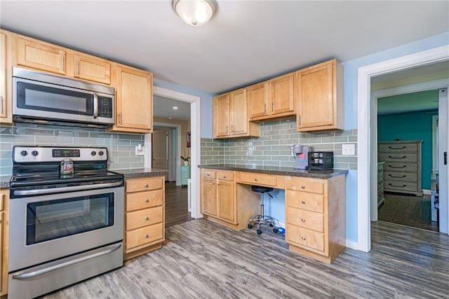 205 Carolyn St, Warwick, RI 02886 - kitchen with stainless steel appliances, light brown cabinets, wood finished floors, and dark countertops