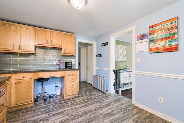 205 Carolyn St, Warwick, RI 02886 - kitchen featuring dark wood finished floors, radiator heating unit, tasteful backsplash, and an office area
