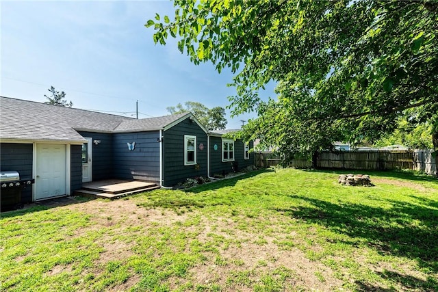 205 Carolyn St, Warwick, RI 02886 - fenced backyard featuring a deck