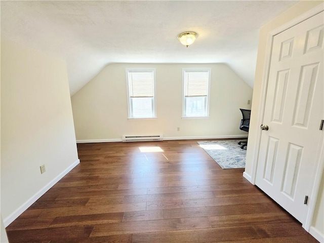 5 Rosemont Ter, North Providence, RI 02911 - bonus room with a baseboard heating unit, vaulted ceiling, dark wood finished floors, and baseboards