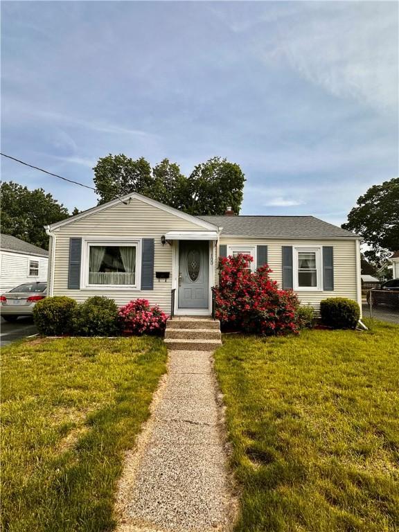 100 Benedict St, Pawtucket, RI 02861 - view of front of house with a front lawn