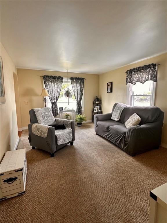 100 Benedict St, Pawtucket, RI 02861 - carpeted living room with healthy amount of natural light