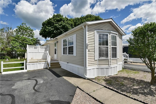 40 Lowell Ave, Pawtucket, RI 02861 - view of home's exterior with a patio area and a wooden deck