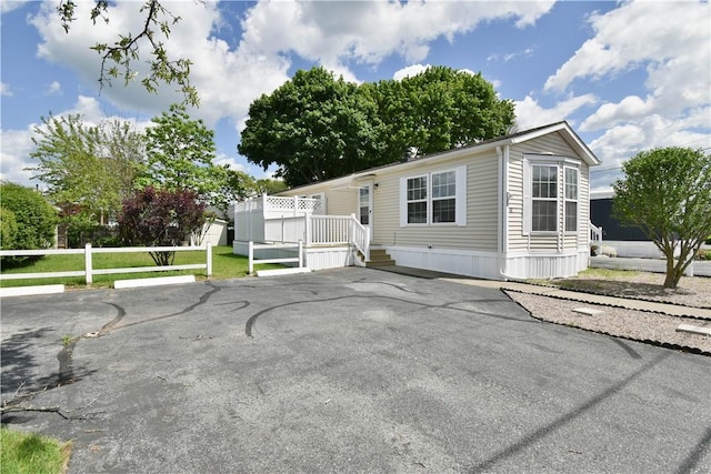 40 Lowell Ave, Pawtucket, RI 02861 - manufactured / mobile home with a wooden deck