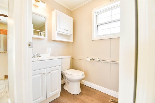 40 Lowell Ave, Pawtucket, RI 02861 - full bath with vanity, ornamental molding, toilet, wood finished floors, and baseboards