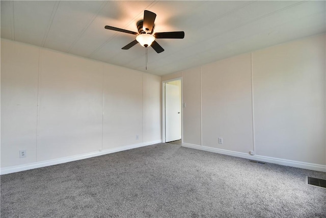 40 Lowell Ave, Pawtucket, RI 02861 - spare room with a ceiling fan, dark carpet, and baseboards