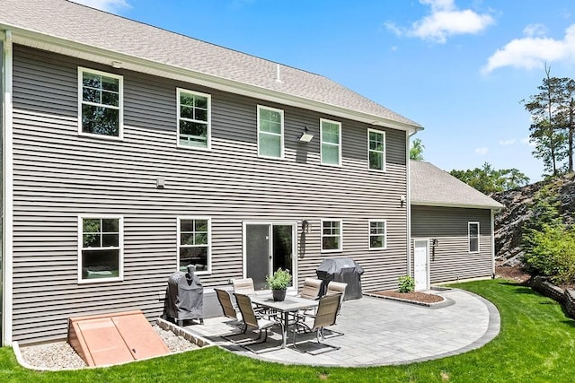 13 Vincent Way, Cumberland, RI 02864 - back of house with a patio area and a lawn